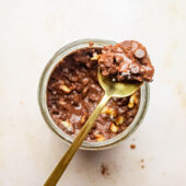 brownie batter overnight oats on spoon and jar