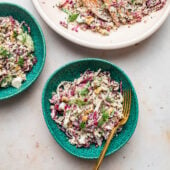 quinoa salad in blue bowls with fork