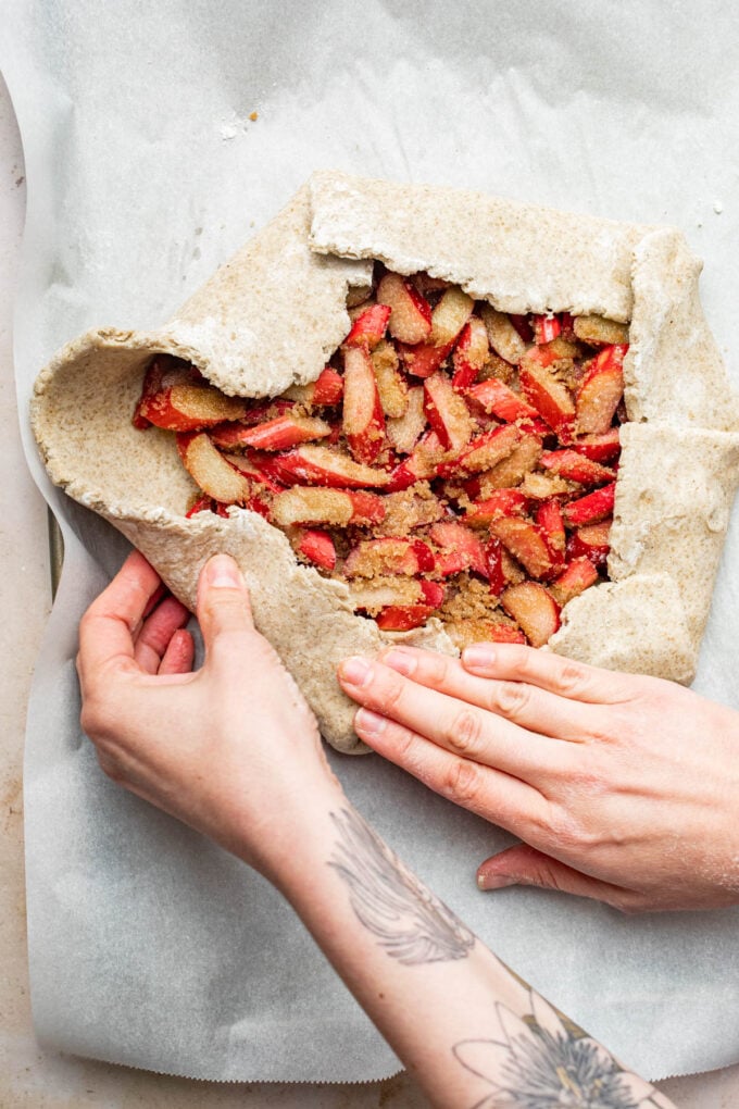 hand folding rhubarb galette