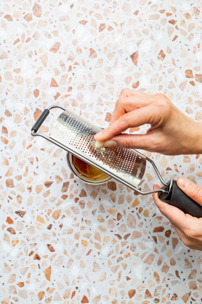 hand grating garlic