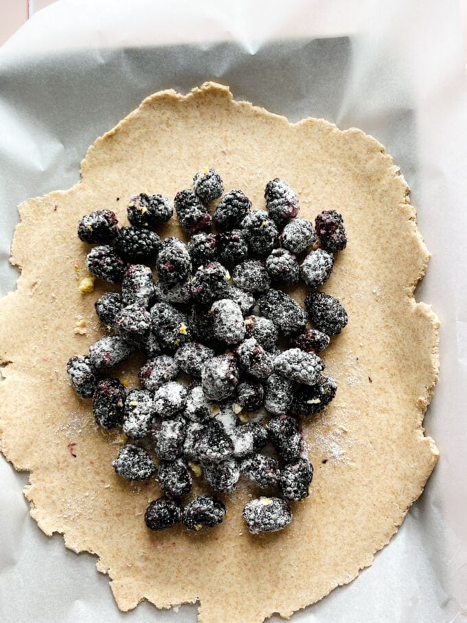 blackberries on dough