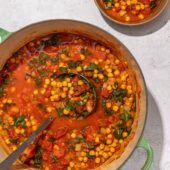 chickpea stew in pot with ladle