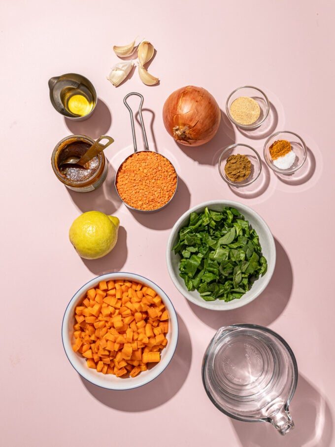 red lentils, spinach, onion in bowls