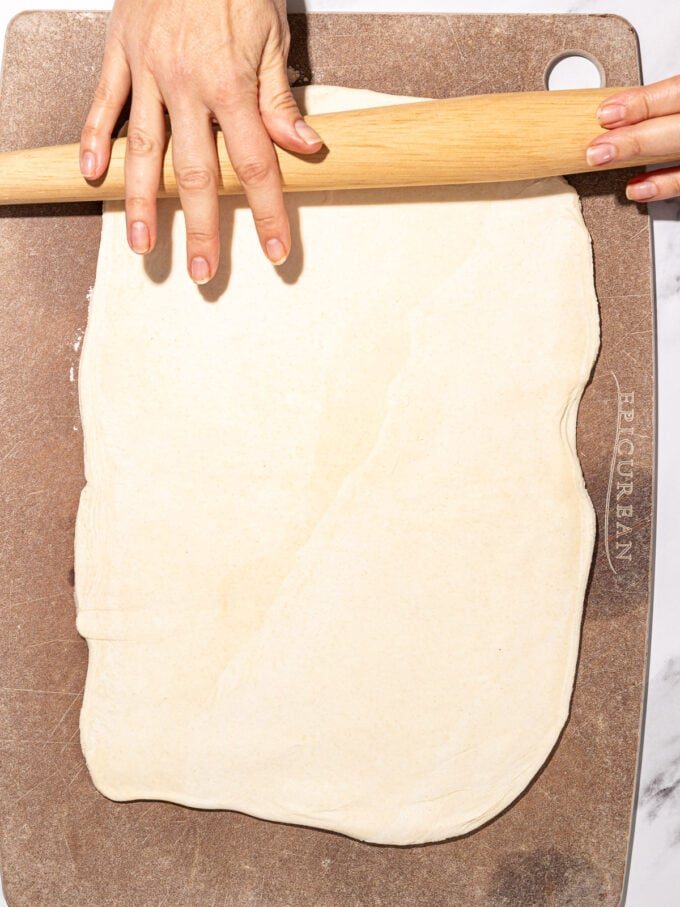 hand rolling puff pastry