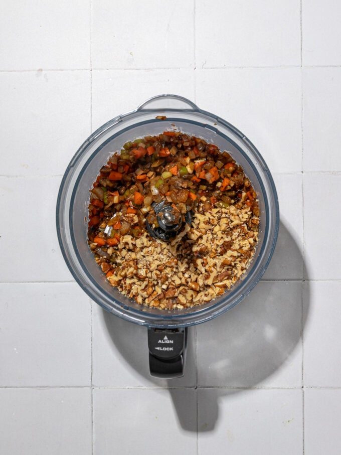 walnuts and cooked vegetables in food processor