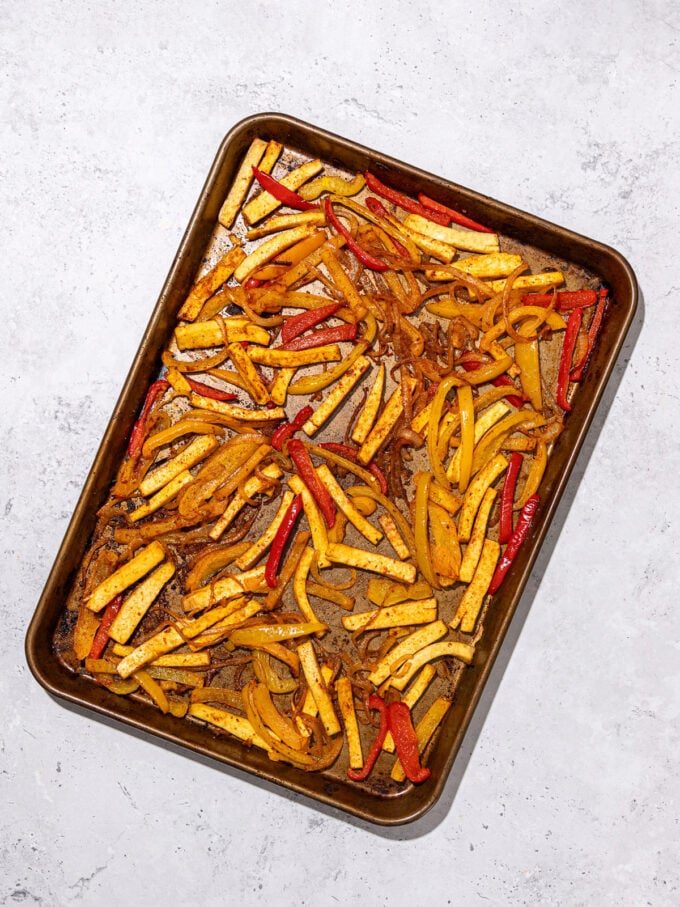 sheet pan with baked tofu, onions and peppers